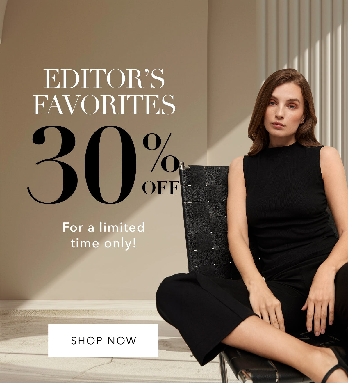 30% off editors favorite sale model sitting on chair wearing black outfit