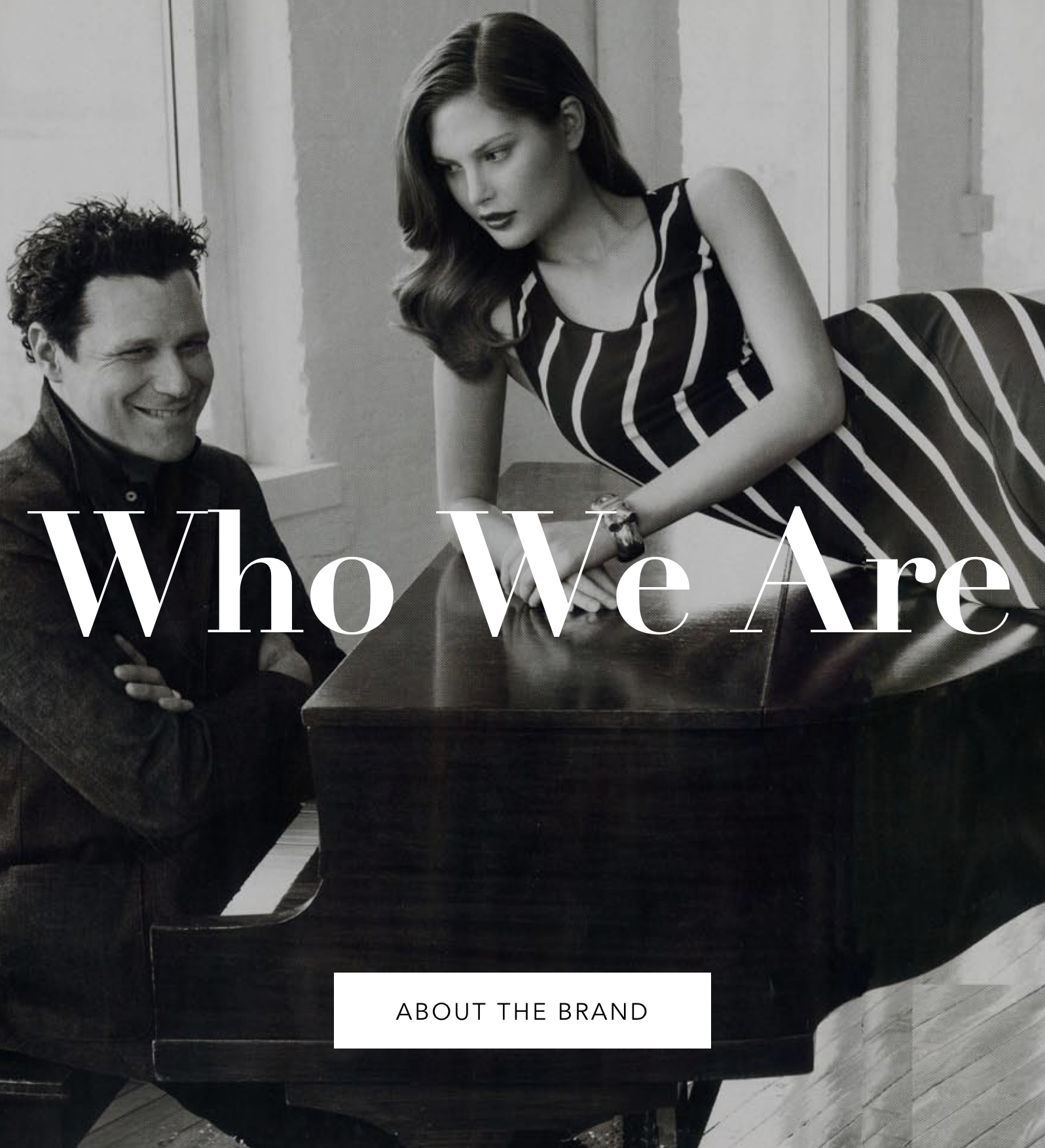 who we are copy over an image of isaac mizrahi sitting a piano with a model laying on top of the piano 